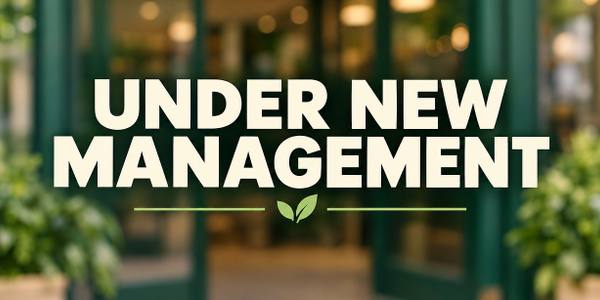Under New Management banner, photo